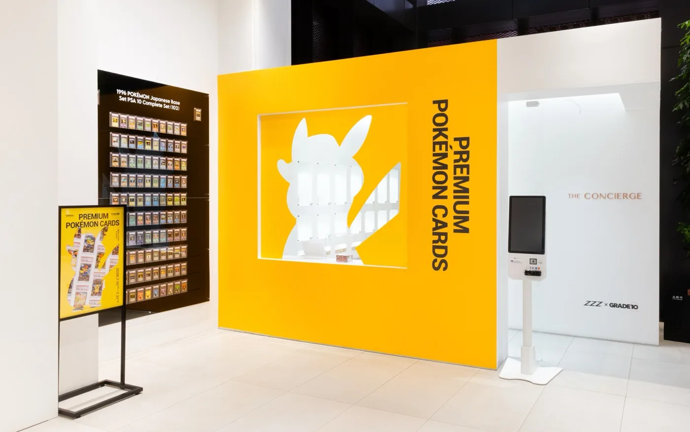 The Seoul Auction x ZZZ x Grade10 trading card exhibition floor with the premium Pokemon card wall.